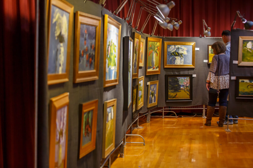wall of art available for sale at the Chadds Ford Art Show and Sale