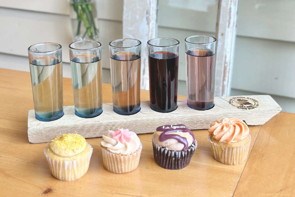 cupcakes and wine on a table
