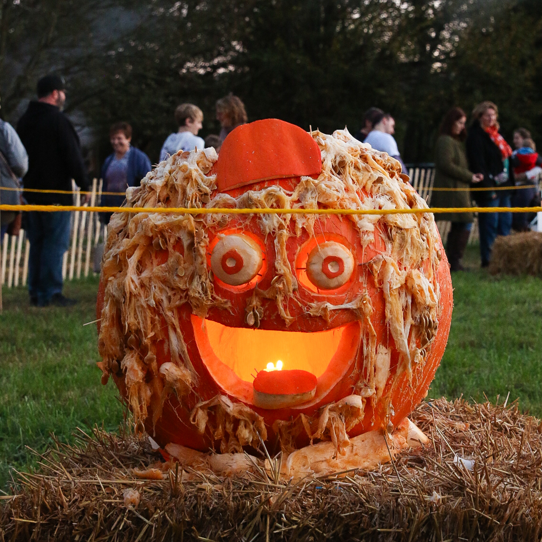 Large carved pumpkin made to look like Gritty