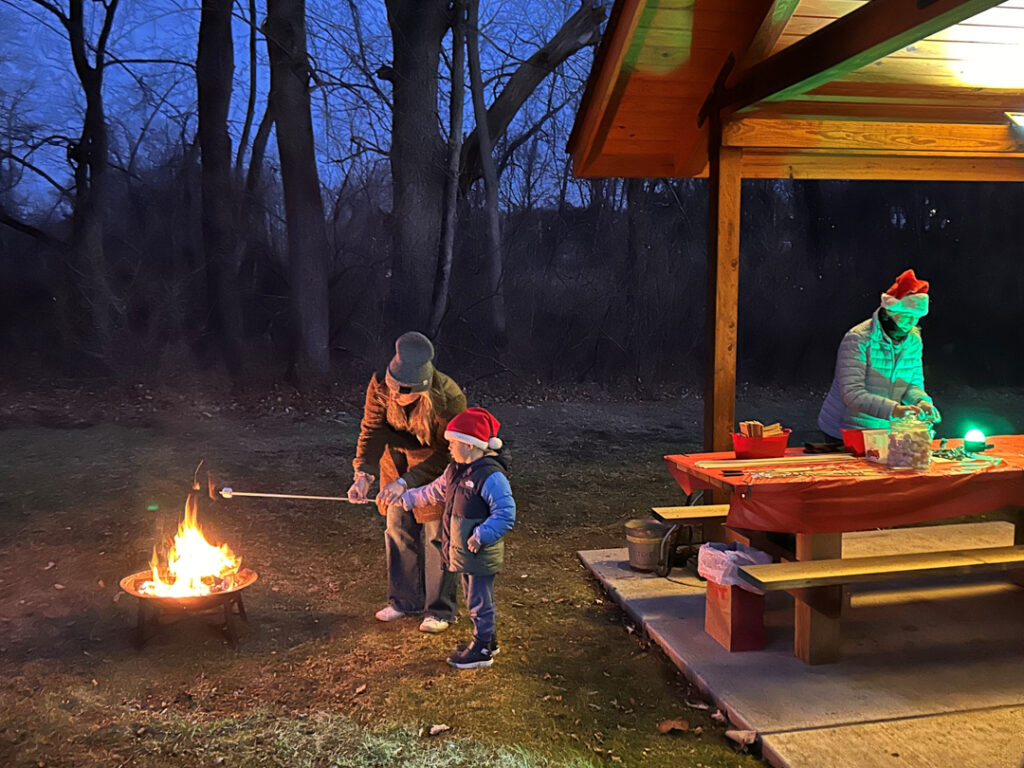 making s'mores over a fire