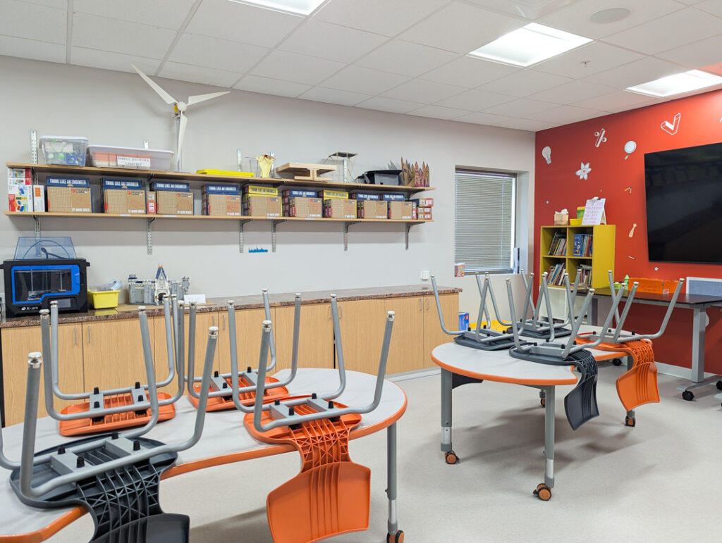 classroom at S2STEM with CrunchLabs kids on the shelves