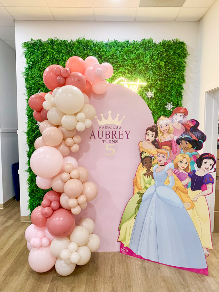 Pink balloon garland at a Princess themed birthday party