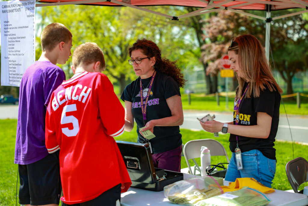 buying tickets at the Patton Spring Carnival